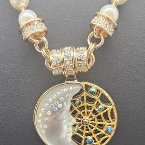 Kirk’s Folly white man in the moon on a web Necklace